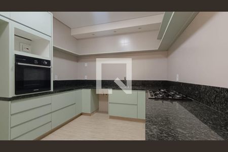 Casa de condomínio à venda com 334m², 4 quartos e 4 vagas Casa de condomínio à venda com 334m², 4 quartos e 4 vagasCozinha