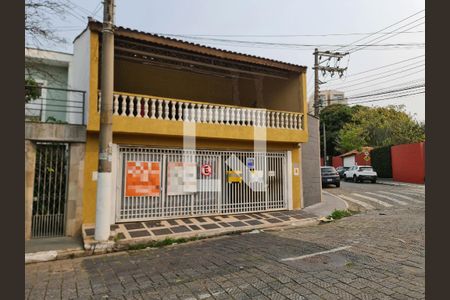 Casa à venda com 243m², 5 quartos e 4 vagas Casa à venda com 243m², 5 quartos e 4 vagasFachada com placa QuintoAndar