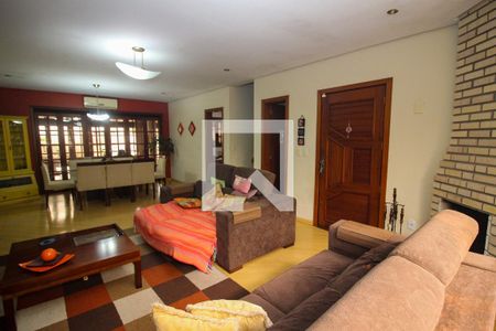 Sala de casa à venda com 3 quartos, 180m² em Guarujá, Porto Alegre