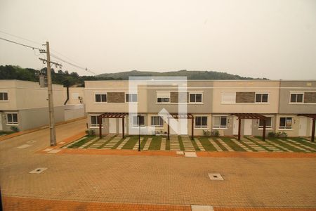 Vista do Quarto 1 de casa de condomínio para alugar com 2 quartos, 88m² em Vila Nova, Porto Alegre