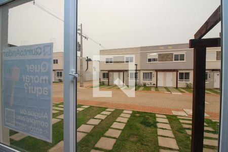 Vista da Sala de casa de condomínio à venda com 2 quartos, 88m² em Vila Nova, Porto Alegre