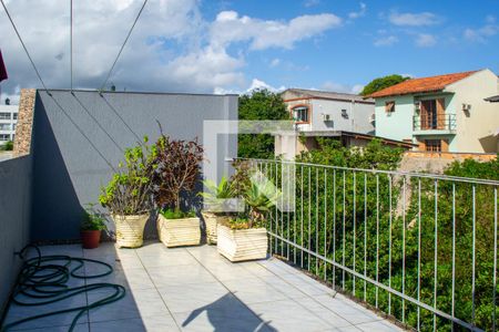 Sacada de casa de condomínio à venda com 3 quartos, 159m² em Tristeza, Porto Alegre