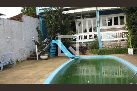 Piscina de casa à venda com 3 quartos, 300m² em Vila Jardim, Porto Alegre