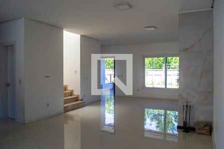 Sala  de casa de condomínio à venda com 4 quartos, 240m² em Hípica, Porto Alegre