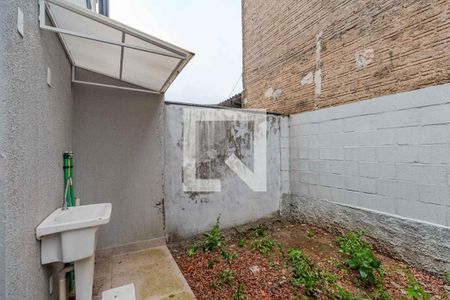 Cozinha e Área de Serviço de casa de condomínio para alugar com 2 quartos, 130m² em Vila Nova, Porto Alegre