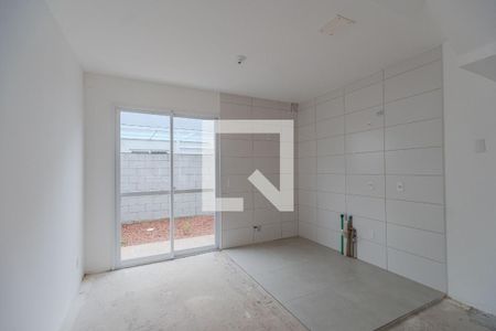 Cozinha e Área de Serviço de casa de condomínio para alugar com 2 quartos, 130m² em Vila Nova, Porto Alegre