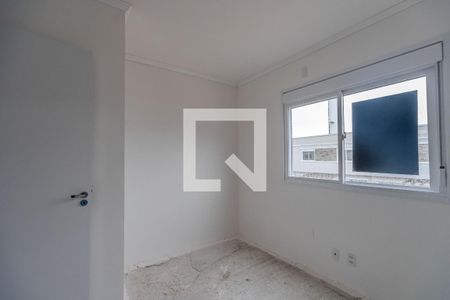 Quarto 1 de casa de condomínio para alugar com 2 quartos, 90m² em Vila Nova, Porto Alegre