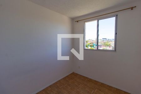 Quarto 2 de apartamento para alugar com 2 quartos, 55m² em Cohab C, Gravataí