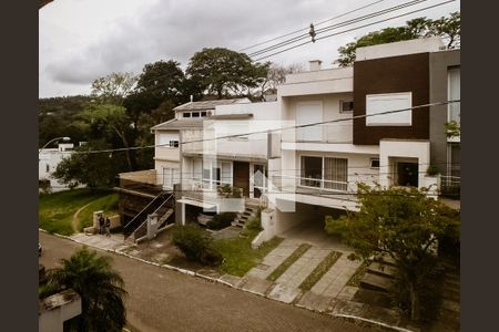 Vista de casa à venda com 3 quartos, 155m² em Vila Nova, Porto Alegre