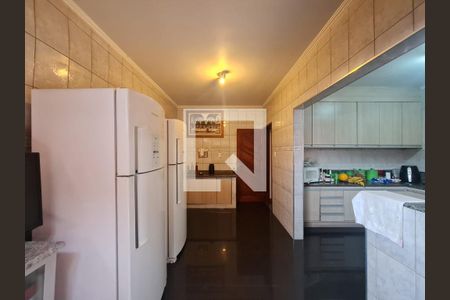 Casa à venda com 315m², 4 quartos e 4 vagas Casa à venda com 315m², 4 quartos e 4 vagasCozinha e Area Gourmet