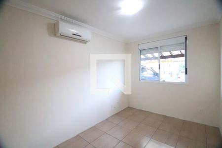 Quarto 2 de casa de condomínio para alugar com 2 quartos, 80m² em Olaria, Canoas