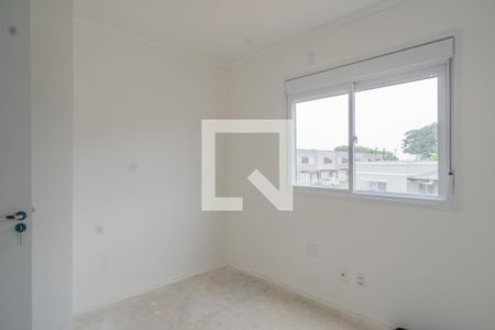 Quarto 2 de casa de condomínio para alugar com 2 quartos, 88m² em Campo Novo, Porto Alegre