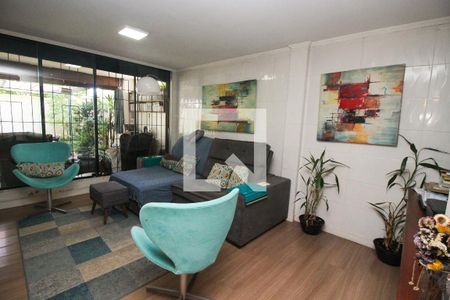 Sala de casa de condomínio para alugar com 3 quartos, 177m² em Ipanema, Porto Alegre