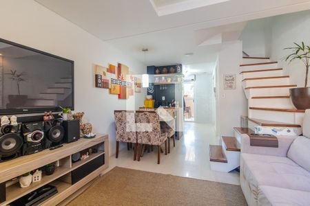 Sala de casa de condomínio à venda com 2 quartos, 96m² em Vila Nova, Porto Alegre