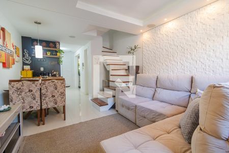 Sala de casa de condomínio à venda com 2 quartos, 96m² em Vila Nova, Porto Alegre