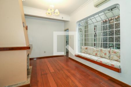 Sala de casa à venda com 3 quartos, 200m² em Rio Branco, Porto Alegre