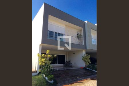 Fachada de casa de condomínio à venda com 3 quartos, 250m² em Sarandi, Porto Alegre