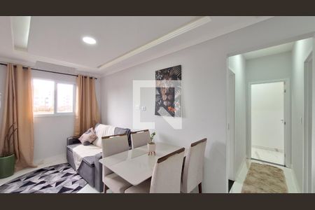 Sala de casa para alugar com 2 quartos, 55m² em Vila Caiçara, Praia Grande