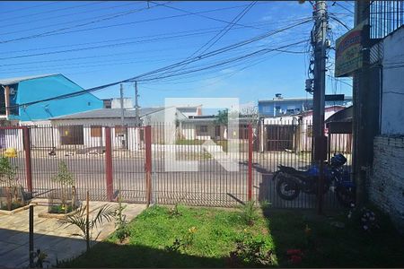 Vista  de casa à venda com 3 quartos, 160m² em Harmonia, Canoas