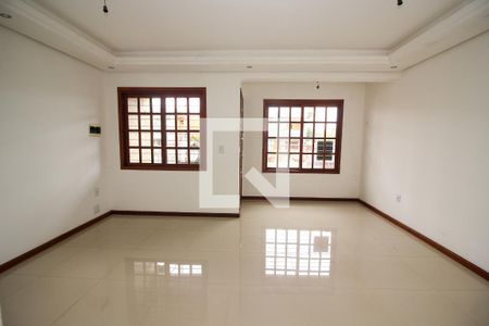 Sala de casa à venda com 3 quartos, 117m² em Guarujá, Porto Alegre