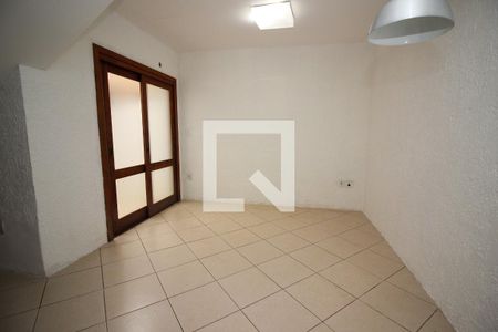 Sala de casa de condomínio à venda com 3 quartos, 103m² em Guarujá, Porto Alegre