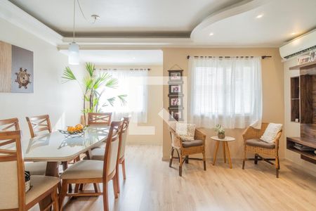 Sala de casa de condomínio à venda com 3 quartos, 145m² em Vila Nova, Porto Alegre