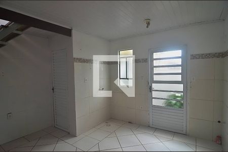 Sala e cozinha de casa de condomínio para alugar com 1 quarto, 44m² em Igara, Canoas