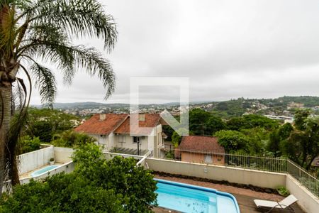 Vista da Sala de casa à venda com 4 quartos, 382m² em Campo Novo, Porto Alegre