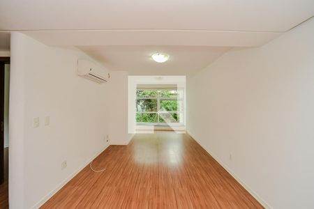 Sala de apartamento à venda com 1 quarto, 60m² em Auxiliadora, Porto Alegre