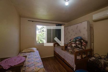 Quarto 2 de casa à venda com 4 quartos, 240m² em Campo Novo, Porto Alegre