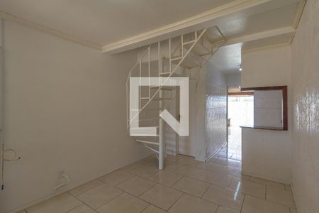 Sala de casa de condomínio para alugar com 2 quartos, 48m² em Rio Branco, Canoas