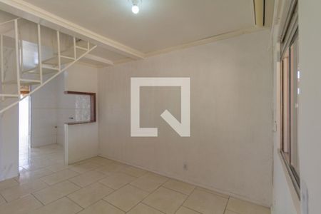 Sala de casa de condomínio para alugar com 2 quartos, 48m² em Rio Branco, Canoas