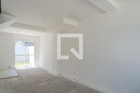 Sala de casa de condomínio à venda com 2 quartos, 88m² em Vila Nova, Porto Alegre