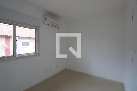 Quarto 1 de casa de condomínio para alugar com 2 quartos, 103m² em Rio Branco, Canoas