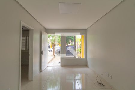 Sala de casa de condomínio para alugar com 2 quartos, 50m² em Rio Branco, Canoas