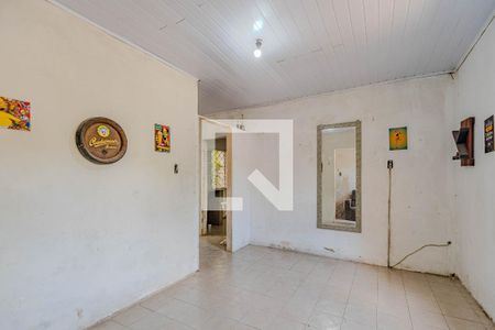 Sala  de casa à venda com 3 quartos, 150m² em Vila Nova, Porto Alegre