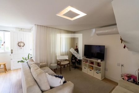 Sala de casa de condomínio à venda com 2 quartos, 148m² em Vila Nova, Porto Alegre