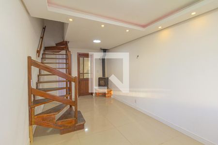 Sala de casa de condomínio à venda com 2 quartos, 77m² em Rio Branco, Canoas