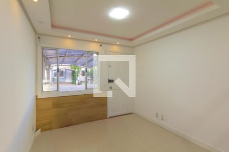 Sala de casa de condomínio à venda com 2 quartos, 77m² em Rio Branco, Canoas