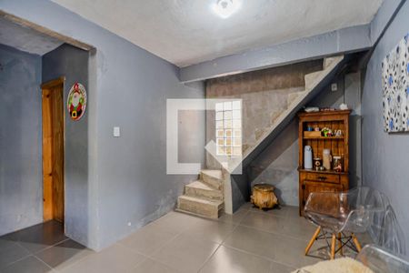 Sala de casa à venda com 4 quartos, 112m² em Vila Nova, Porto Alegre