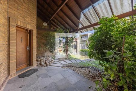 Entrada de casa à venda com 4 quartos, 269m² em Vila Jardim, Porto Alegre