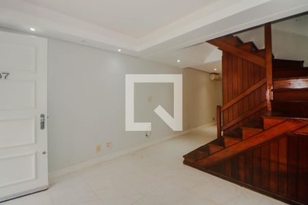 Sala de casa de condomínio para alugar com 3 quartos, 104m² em Humaitá, Porto Alegre