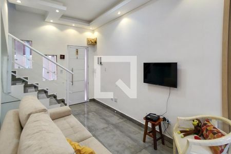 Sala de casa de condomínio para alugar com 2 quartos, 60m² em Maracanã, Praia Grande