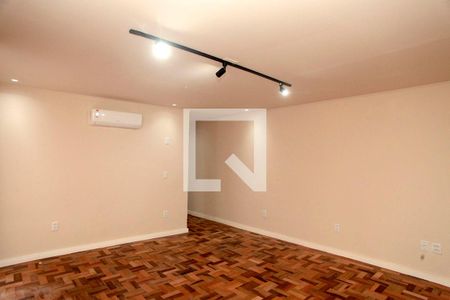 Sala de apartamento à venda com 1 quarto, 63m² em Auxiliadora, Porto Alegre