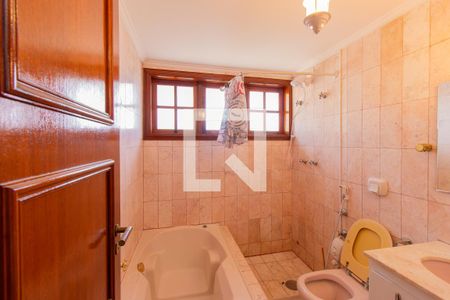 Casa de condomínio para alugar com 454m², 8 quartos e 6 vagas Casa de condomínio para alugar com 454m², 8 quartos e 6 vagasBanheiro da Suíte 1