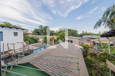 Vista de casa à venda com 2 quartos, 96m² em Coronel Aparicio Borges, Porto Alegre