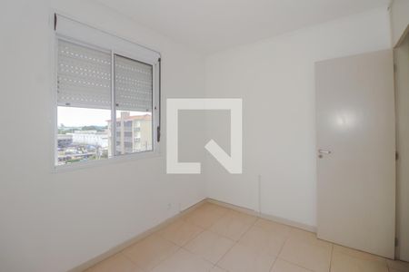 Quarto 1 de apartamento para alugar com 2 quartos, 58m² em Humaitá, Porto Alegre