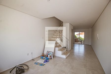 Sala de casa à venda com 3 quartos, 105m² em Guarujá, Porto Alegre