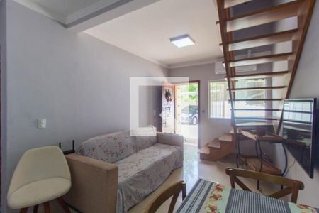 Sala de casa de condomínio para alugar com 2 quartos, 127m² em Harmonia, Canoas