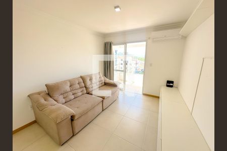 Sala de apartamento para alugar com 1 quarto, 69m² em Canasvieiras, Florianópolis